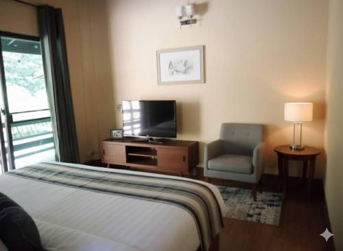 Et tv og/eller underholdning på เฌอPrime Cher Prime by Tree house Maelai