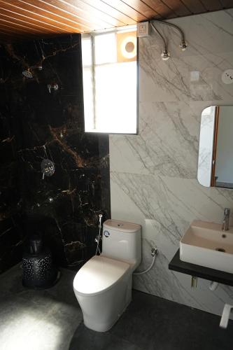 Ένα μπάνιο στο The President Hotel, Tumkur