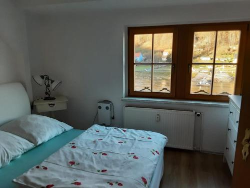 Postel nebo postele na pokoji v ubytování Elbblick