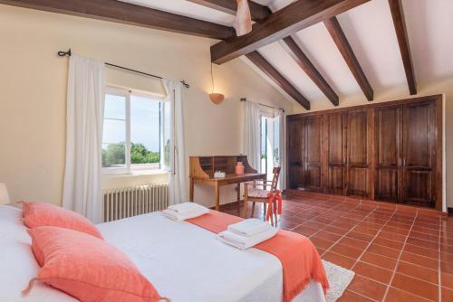 Ένα ή περισσότερα κρεβάτια σε δωμάτιο στο Casa BINIALI