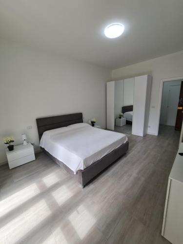 Giường trong phòng chung tại Barletta Events