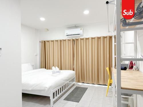 En eller flere senge i et værelse på Smart Luxury House in Hat Yai