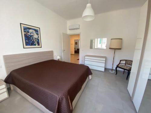 Postel nebo postele na pokoji v ubytování Un passo dal mare, AC, due bagni