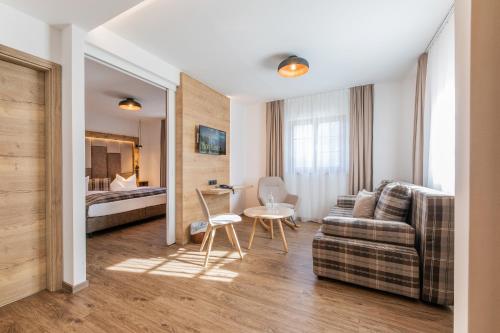 Postel nebo postele na pokoji v ubytování Hotel Hoferwirt