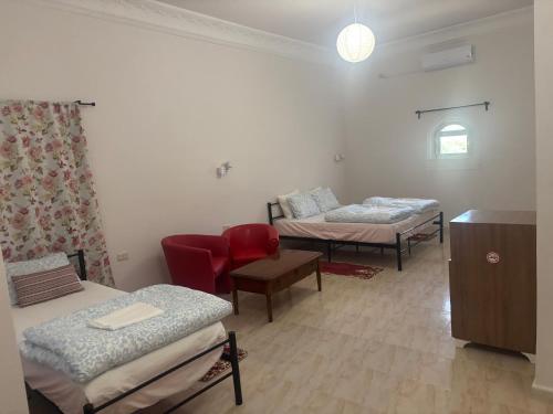 Ένα ή περισσότερα κρεβάτια σε δωμάτιο στο Motel EL Golla