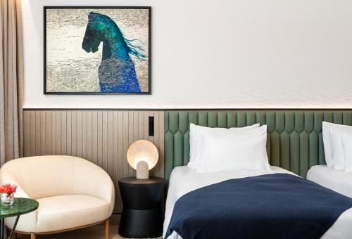 Ένα ή περισσότερα κρεβάτια σε δωμάτιο στο Radisson Collection Hotel, Bodrum