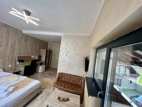 En eller flere senge i et værelse på Casa Braneana