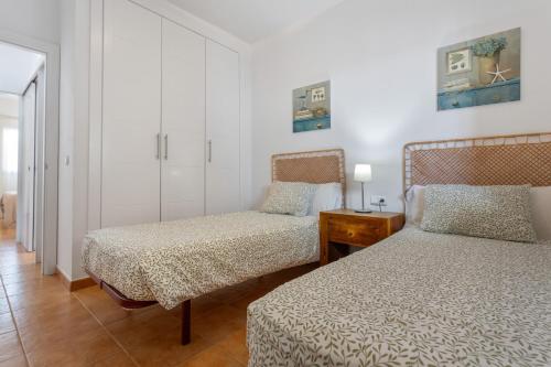 En eller flere senge i et værelse på Villa Alfredina