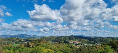 a view of the mountains under a cloudy sky at Relax House Lara in Krapinske Toplice in Krapinske Toplice