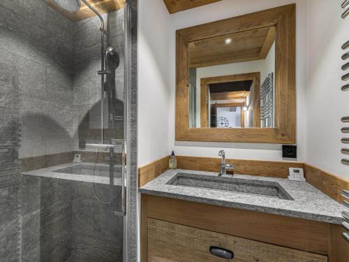 a bathroom with a shower and a sink at Duplex Charmant Près des Pistes avec Hammam et Cheminée à Courchevel Le Praz - FR-1-568-8 in Courchevel