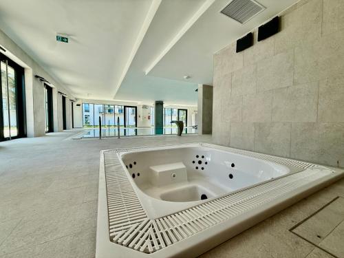 Foto sihtkohas Niechorze asuva majutusasutuse Rezydencja Niechorze 225 z Basenem, Sauną, Jacuzzi w cenie - 5D Apartments galeriist