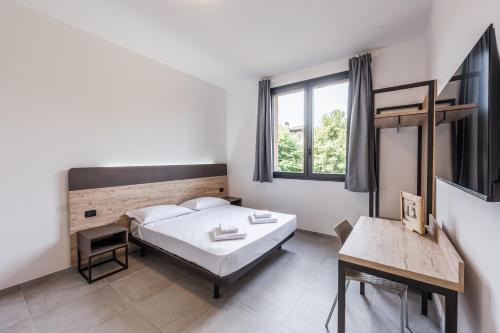 Postel nebo postele na pokoji v ubytování Residence La Luma