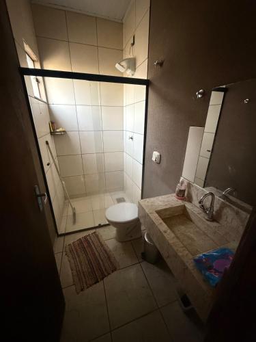 Et badeværelse på Microcasa Aconchegante, tudo para sua hospedagem!