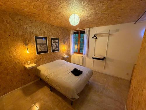 Postel nebo postele na pokoji v ubytování Le Champenois