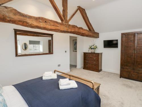 En eller flere senge i et værelse på The Robins Nest