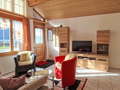 Μια τηλεόραση ή/και κέντρο ψυχαγωγίας στο Apartment Am Brienzersee by Interhome