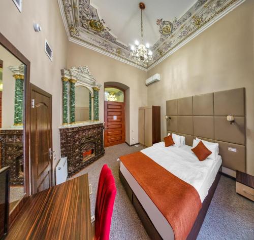 Giường trong phòng chung tại Boutique Garden De Baku