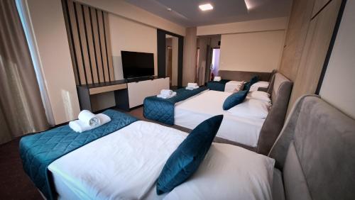 Ένα ή περισσότερα κρεβάτια σε δωμάτιο στο Hotel Brcko Gas Prijedor