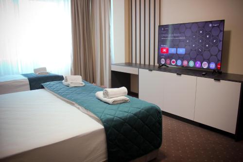 Ένα ή περισσότερα κρεβάτια σε δωμάτιο στο Hotel Brcko Gas Prijedor