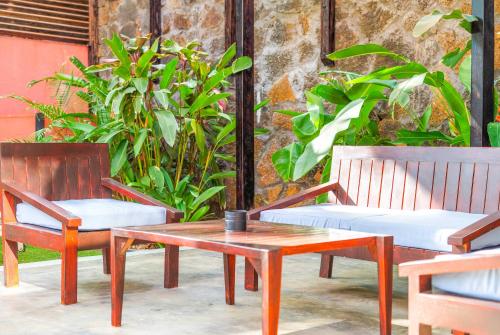 Ein Sitzbereich in der Unterkunft Residence Laurada - Tropical Villas with Private Pool