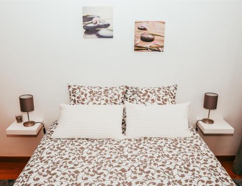 En eller flere senge i et værelse på Giestal Terrace By Gt House