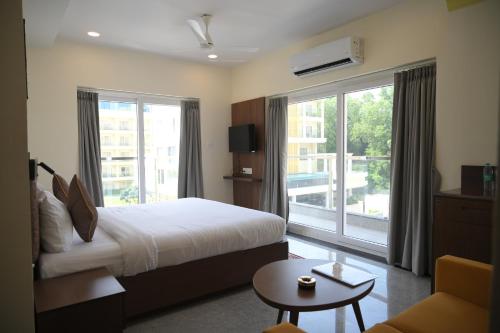 Ένα ή περισσότερα κρεβάτια σε δωμάτιο στο Aither