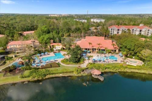 an aerial view of a resort with a swimming pool at 3 Bedrooms 25 Bathrooms Encantada 3091 Yl in Orlando