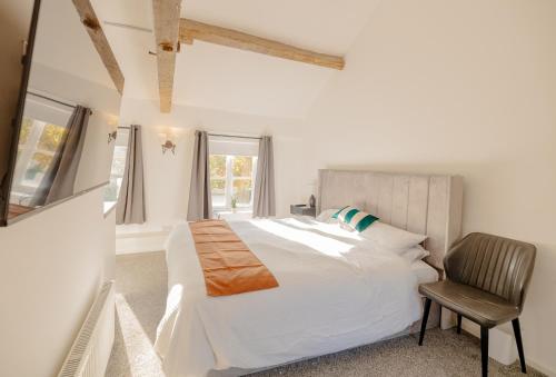 Ένα ή περισσότερα κρεβάτια σε δωμάτιο στο Ye Olde Original Withy Trees