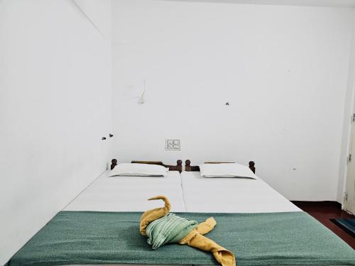 Marari Aleena Beach Homestay客房内的一张或多张床位