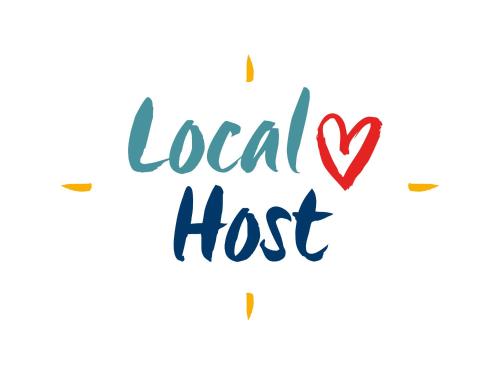 a lettering local host with a red heart isolated on white background illustration at House Majda in Zagreb