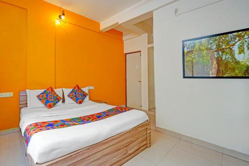 Ένα ή περισσότερα κρεβάτια σε δωμάτιο στο Via Arrow Residency