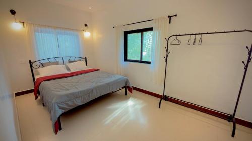 Ένα ή περισσότερα κρεβάτια σε δωμάτιο στο Meraki Casa