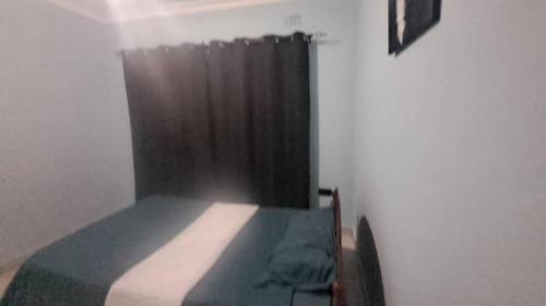 Una cama o camas en una habitación de Nomad's Nest