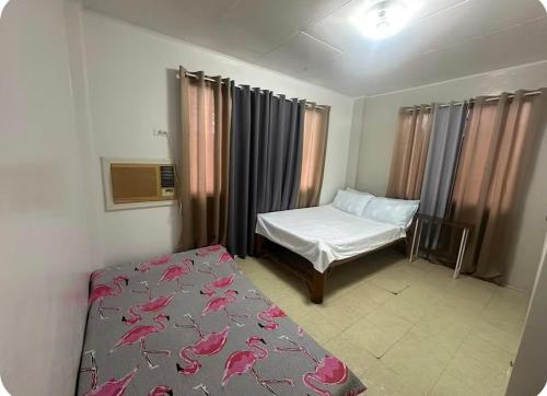 Ένα ή περισσότερα κρεβάτια σε δωμάτιο στο Cozy Home by Sol