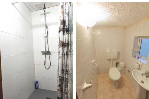 a bathroom with a shower and a toilet and a sink at Cozy Room with Queensize bed in Historic House in Senglea