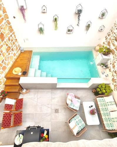 an overhead view of a swimming pool in a house at Recuerdos del Sur in El Gastor