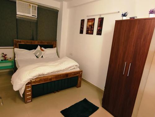 Postel nebo postele na pokoji v ubytování Exotic Bliss for comfort stay