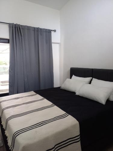 Postel nebo postele na pokoji v ubytování La Casa del Mirador