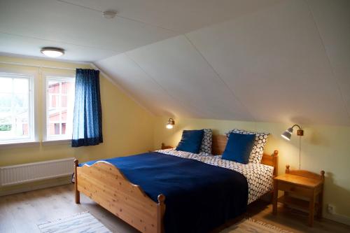 Postel nebo postele na pokoji v ubytování THE LODGE Torsby