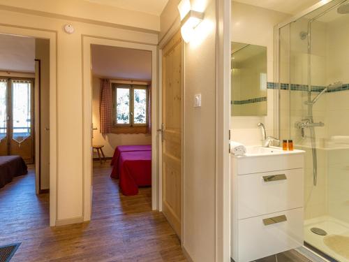 a bathroom with a sink and a shower and a tub at Appartement 2 chambres centre village proche pistes avec Wifi - FR-1-437-60 in La Clusaz