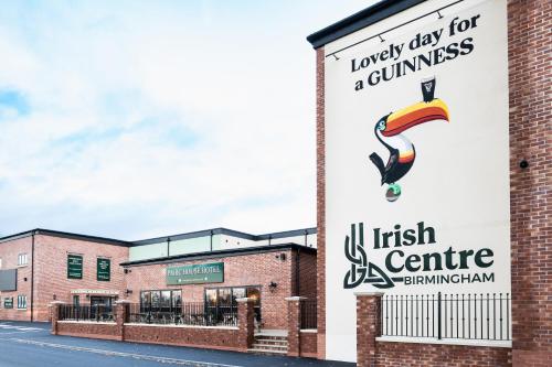 a sign on the side of a building at Pairc House Hotel in Birmingham