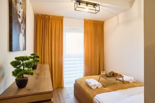 Postel nebo postele na pokoji v ubytování Apartament Zamkowy Kopisto 11 - Apartamenty Zamkowe Centrum miasta Rzeszów