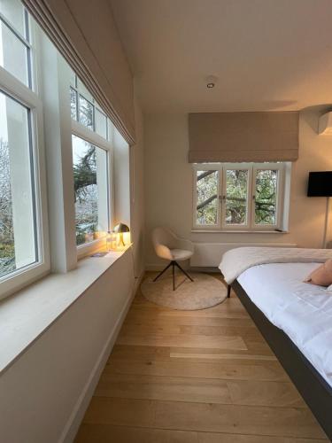 Postel nebo postele na pokoji v ubytování Villa Magnolia B&B