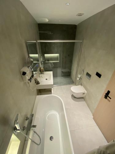 Ένα μπάνιο στο Rek Holiday Hotel