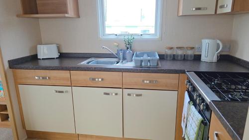 Η κουζίνα ή μικρή κουζίνα στο Ruby Atlas Monreith