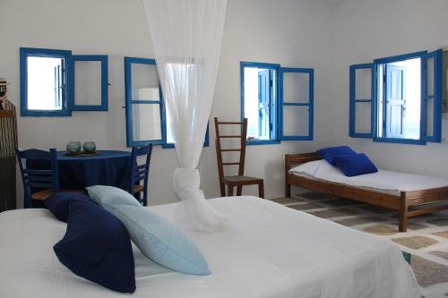 Postel nebo postele na pokoji v ubytování Artistic Villa