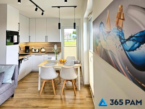 Kuchyň nebo kuchyňský kout v ubytování 365PAM - Apartament Flow z Ogrodem