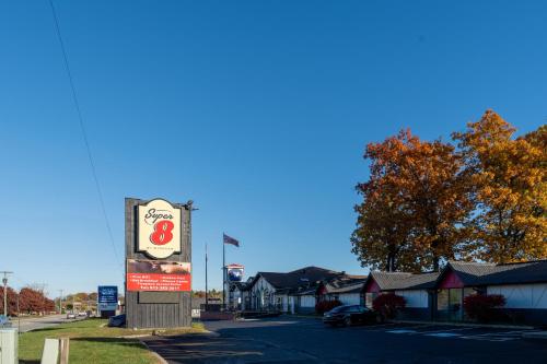 a sign for a gas station on a street at Super 8 by Wyndham Gananoque - Country Squire Resort in Gananoque