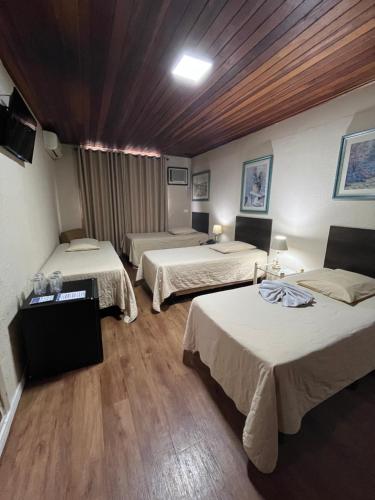 Un ou plusieurs lits dans un hébergement de l'établissement Skalla Hotel Nova Odessa