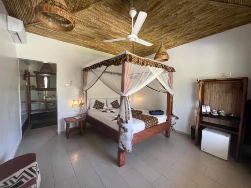 Postel nebo postele na pokoji v ubytování AbCa's Creek Lodge